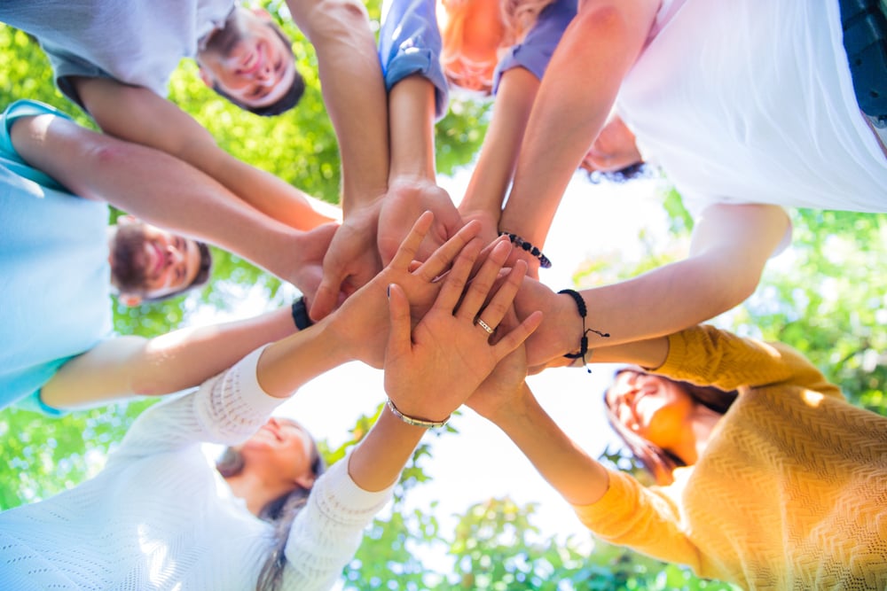 Group of a friends hands together